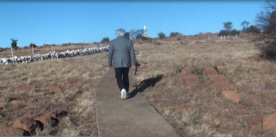 Arun walking up hill at Spioenkop